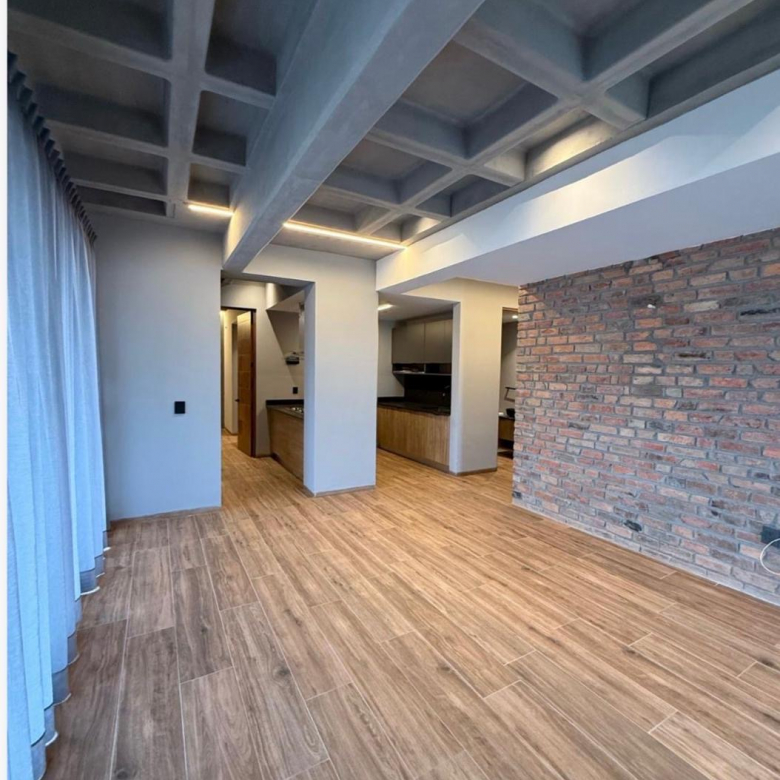 Loft moderno en renta Torre Mystiq, San Luis Potosí - Interior con acabados de lujo y cocina equipada.