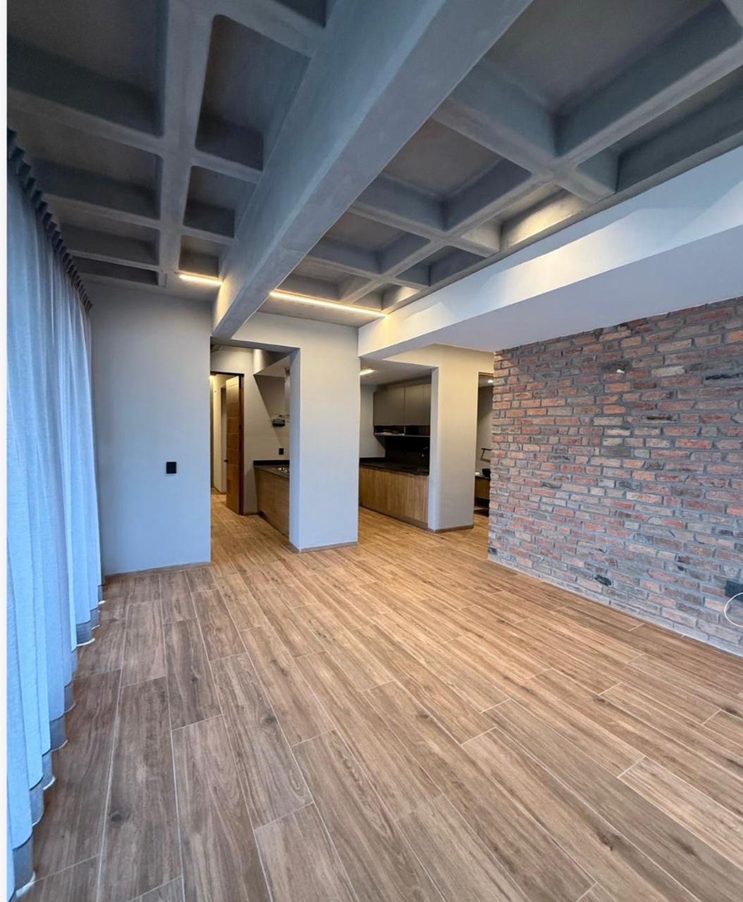 loft-renta-torre-mystiq-slp Loft moderno en renta Torre Mystiq, San Luis Potosí - Interior con acabados de lujo y cocina equipada.