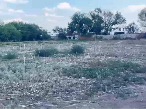 Terreno en venta en Las Cofradías, Soledad de Graciano Sánchez, SLP - Vista aérea y delimitación del lote de 6,000 m2 con pozo.